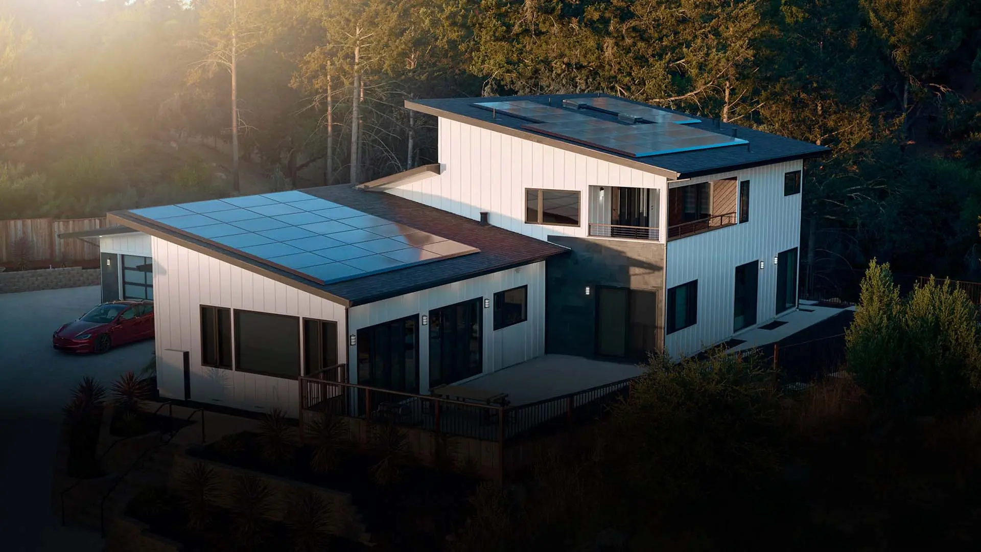 Aerial view of a house with Tesla solar panels